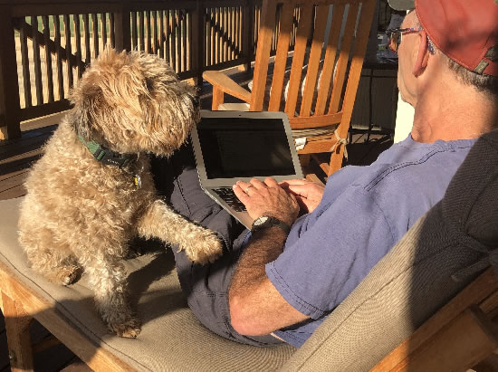 Gloria helping David with the final draft.